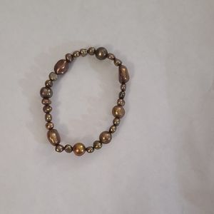 Brown freshwater Pearl elastic bracelet. 7"